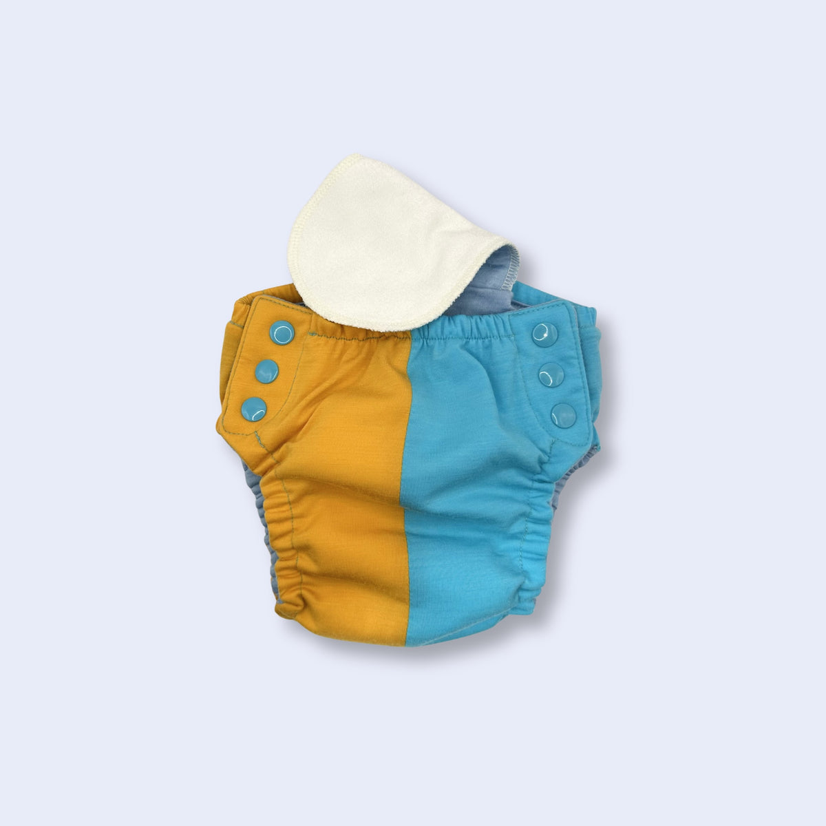 Gogo Shorties Merino-blend Toilet Training Pants - view of how to put in Booster Pad Insert. 