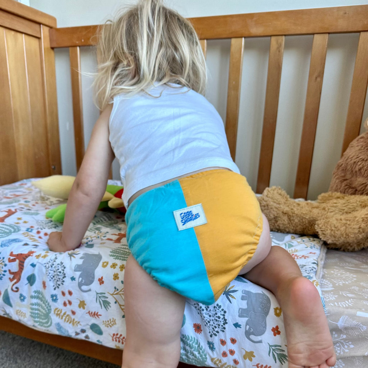 Merino-blend Toilet Training Pants - Size Small on child jumping into bed