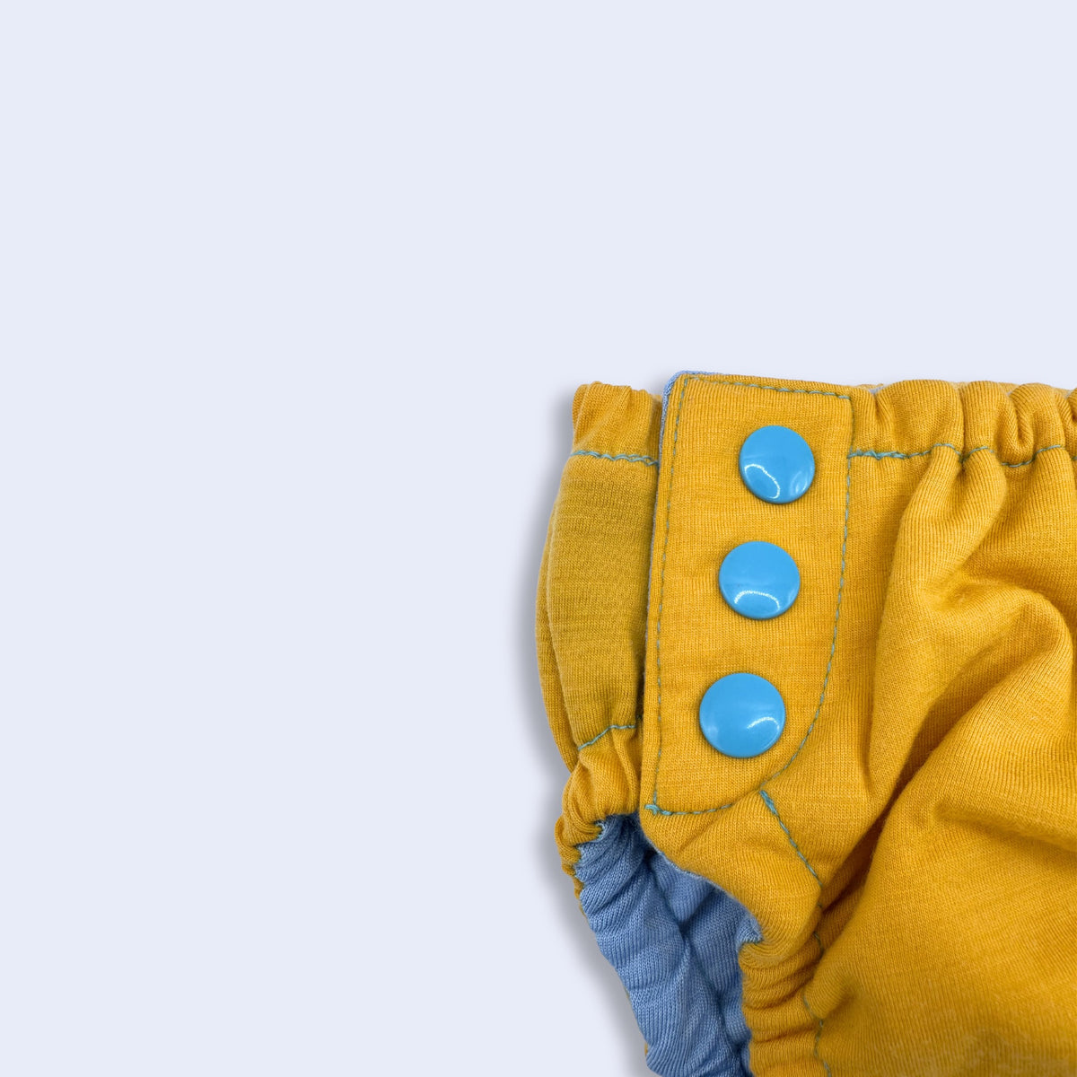 Merino-blend Toilet Training Pants - Size Small. Close up of snaps and fabric.